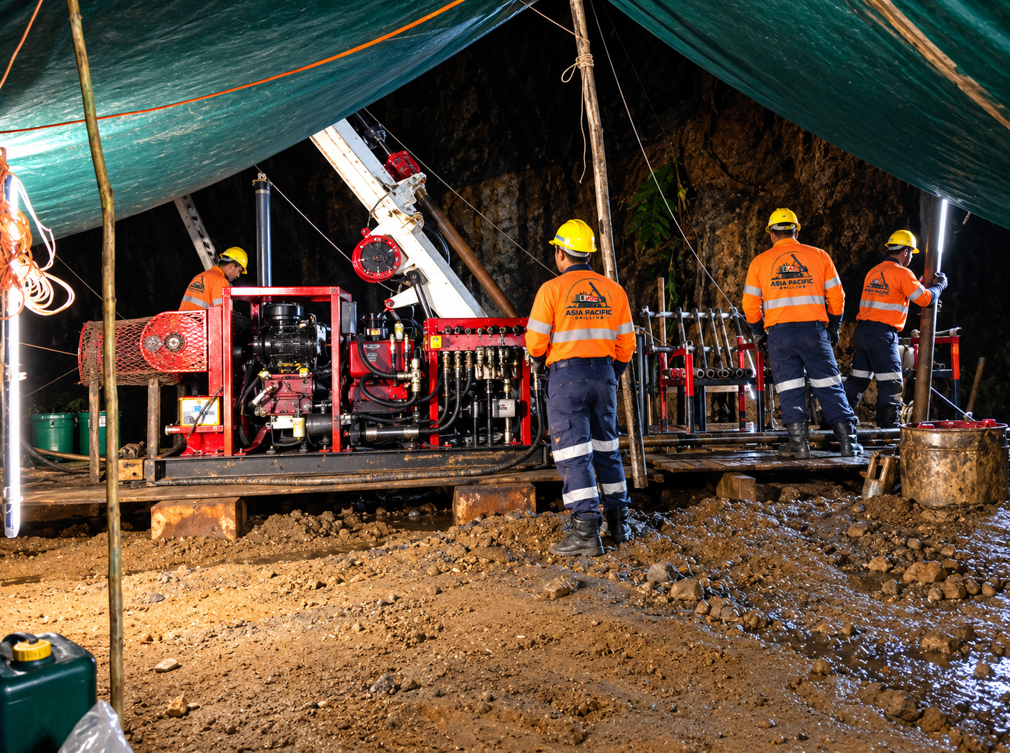 Asia Pacific Drilling crew operating a drill rig at a rocky field site